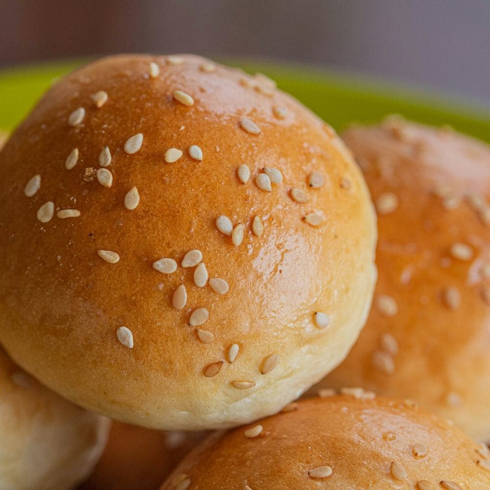 Soft brioche buns ready for salted honey butter