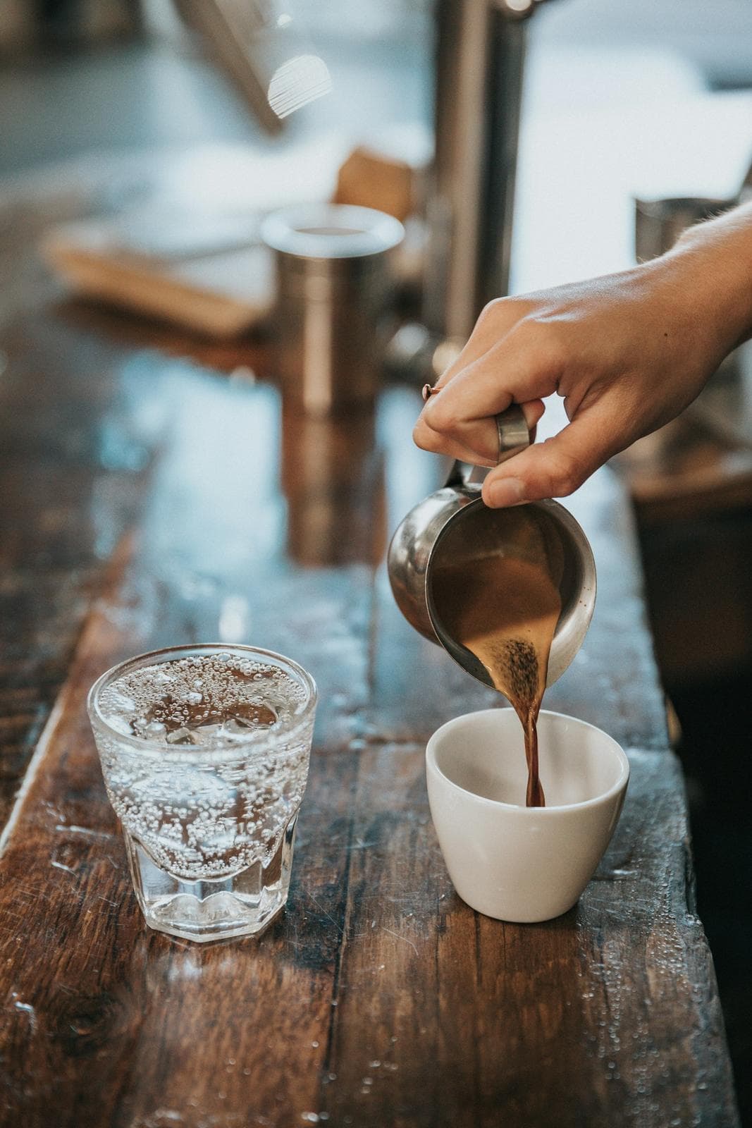 Gooseneck kettle pouring over a coffee dripper