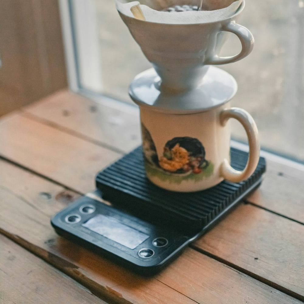 V60 pour-over brewing into a cup