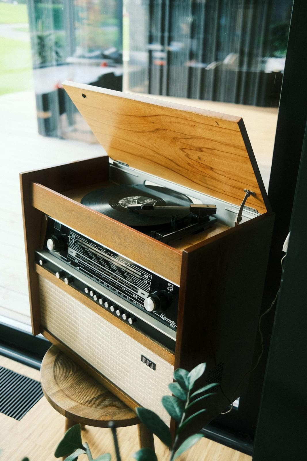 Vintage record player on a wooden console
